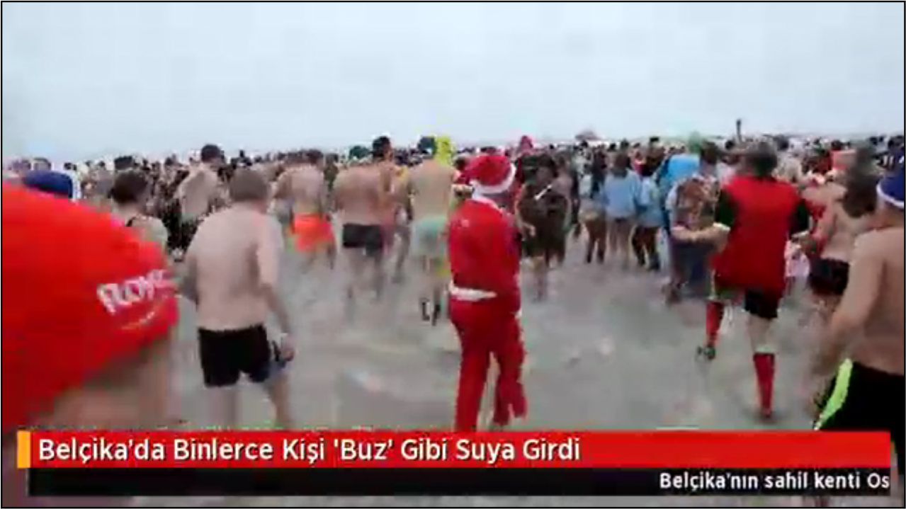 Belçika'da Binlerce Kişi 'Buz' Gibi Suya Girdi 