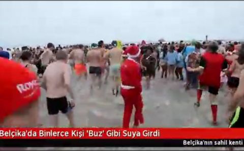 Belçika'da Binlerce Kişi 'Buz' Gibi Suya Girdi 